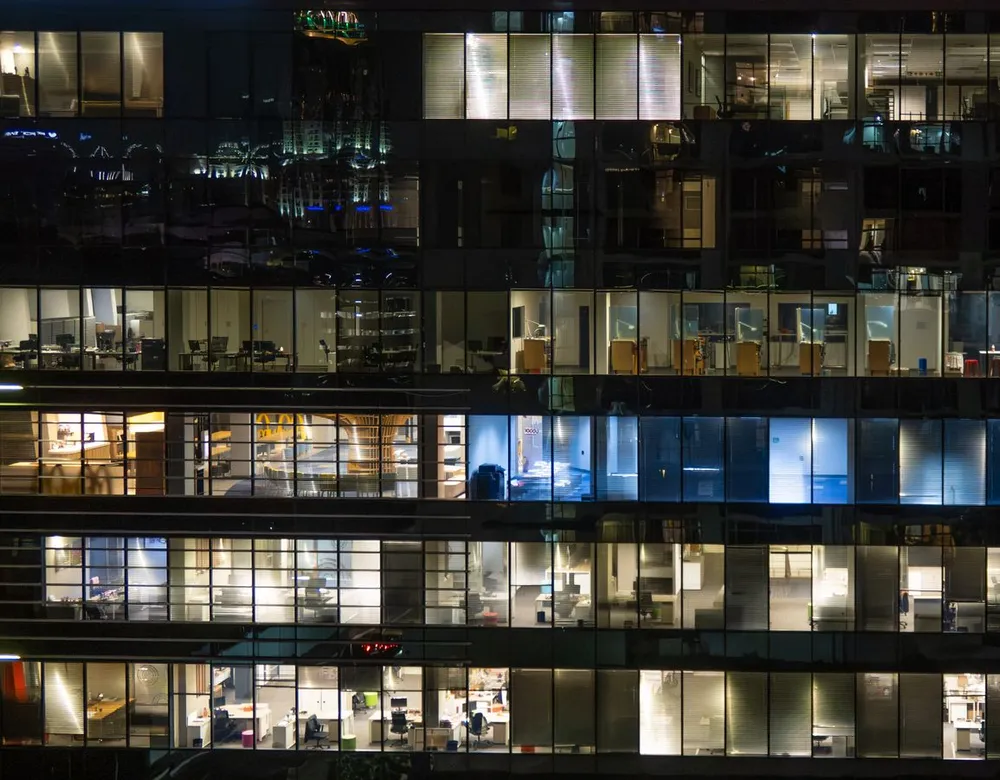 Office building lit up at night